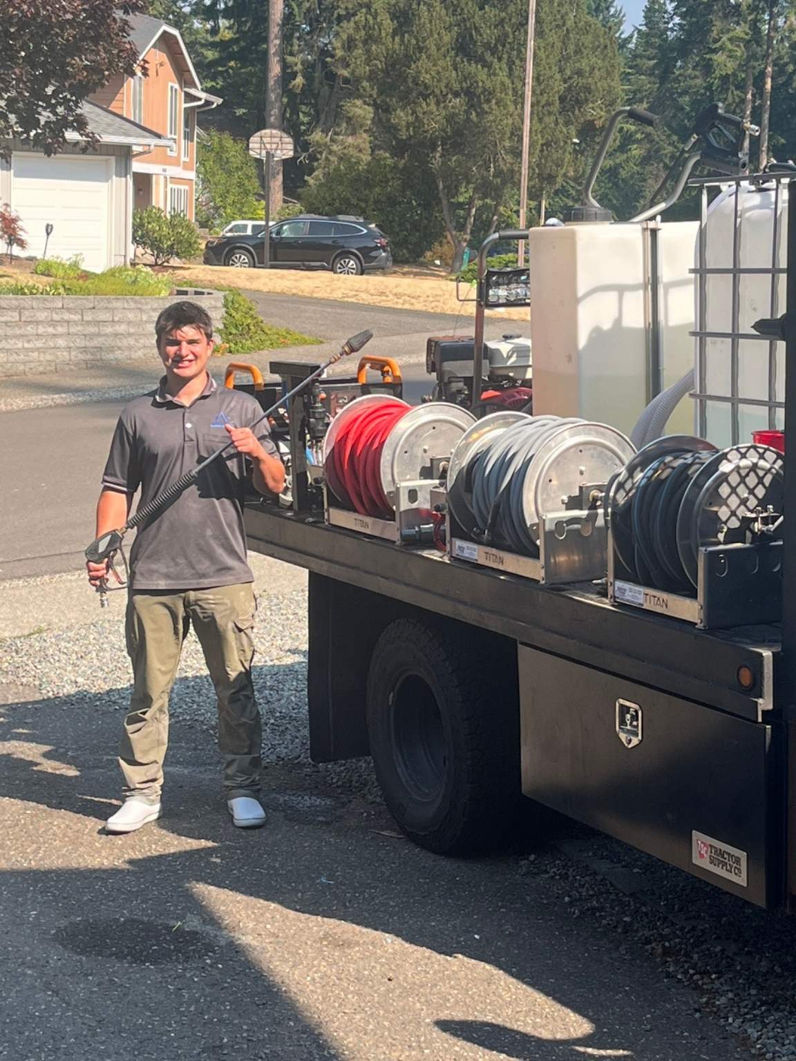 Christopher Anderson with Anderson Pressure Washing equipment